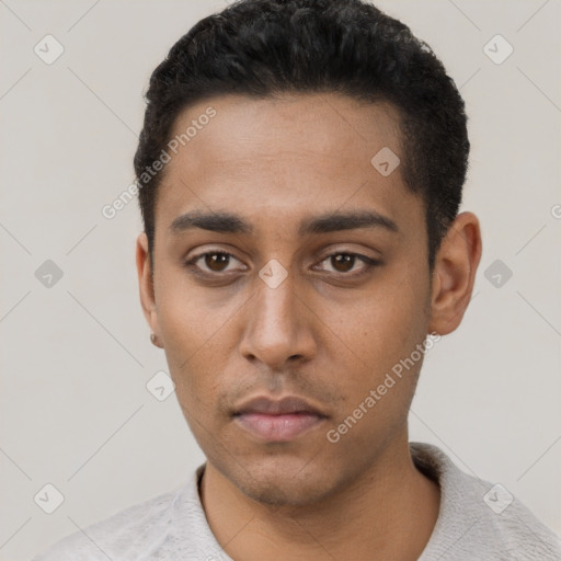 Neutral latino young-adult male with short  black hair and brown eyes