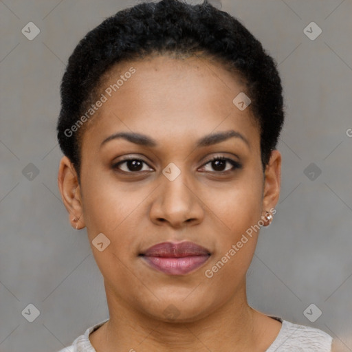 Joyful black young-adult female with short  black hair and brown eyes