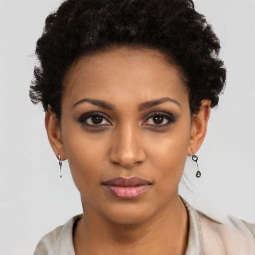 Neutral black young-adult female with short  black hair and brown eyes