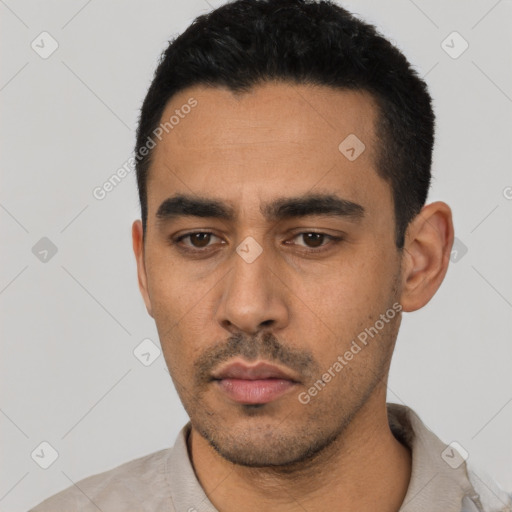 Neutral latino young-adult male with short  black hair and brown eyes