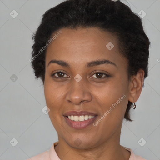 Joyful latino young-adult female with short  brown hair and brown eyes