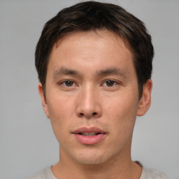 Neutral asian young-adult male with short  brown hair and brown eyes