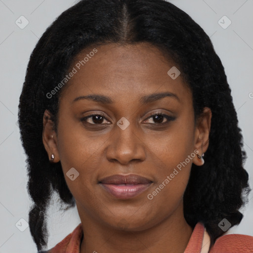 Joyful black young-adult female with medium  brown hair and brown eyes