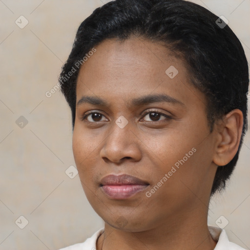 Joyful latino young-adult female with short  black hair and brown eyes