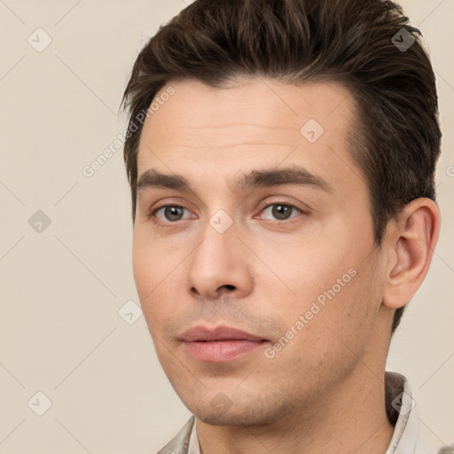 Neutral white young-adult male with short  brown hair and brown eyes