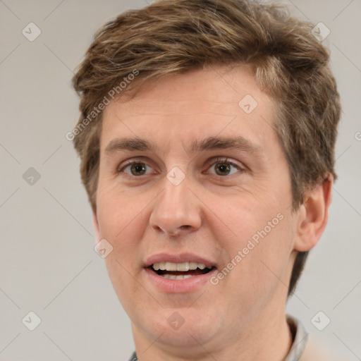 Joyful white adult male with short  brown hair and grey eyes