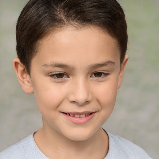 Joyful white child female with short  brown hair and brown eyes