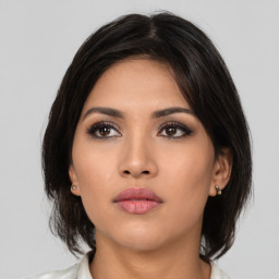 Neutral asian young-adult female with medium  brown hair and brown eyes