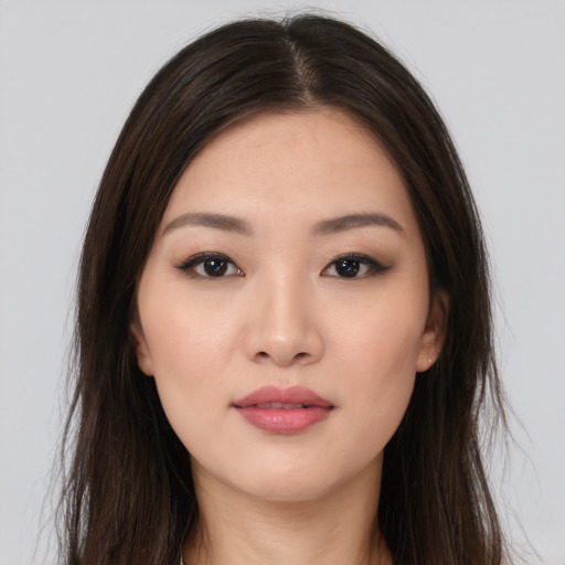 Neutral asian young-adult female with long  brown hair and brown eyes