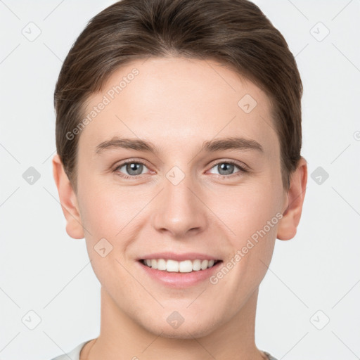 Joyful white young-adult female with short  brown hair and grey eyes