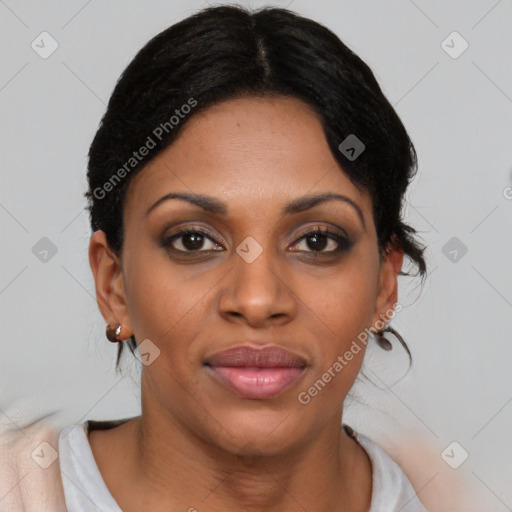 Joyful black young-adult female with short  black hair and brown eyes