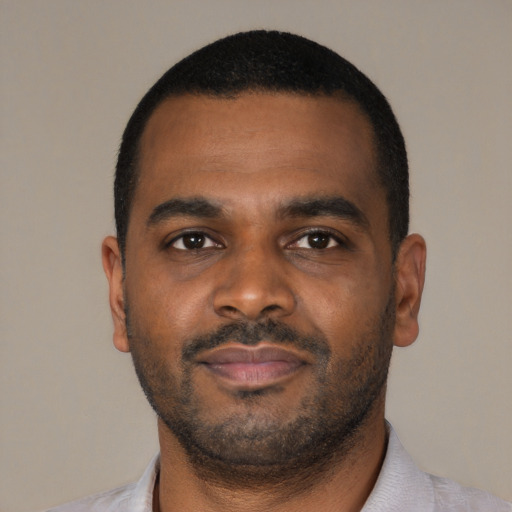 Neutral black young-adult male with short  black hair and brown eyes