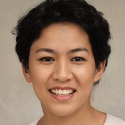 Joyful asian young-adult female with short  black hair and brown eyes