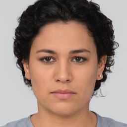 Neutral white young-adult female with short  brown hair and brown eyes