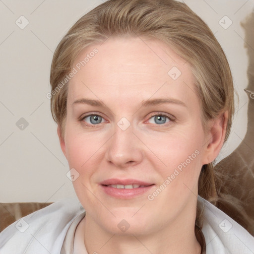 Joyful white young-adult female with medium  brown hair and blue eyes