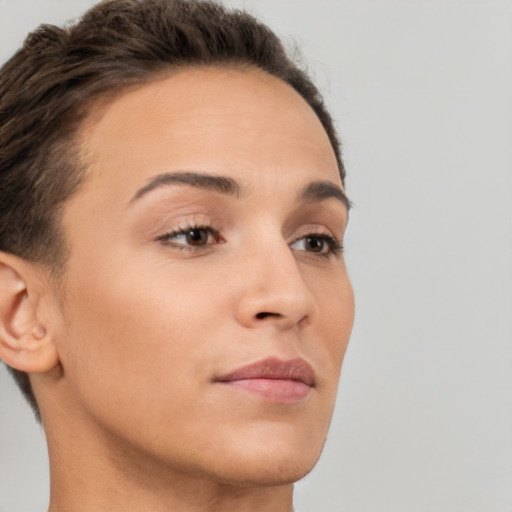 Neutral white young-adult female with short  brown hair and brown eyes