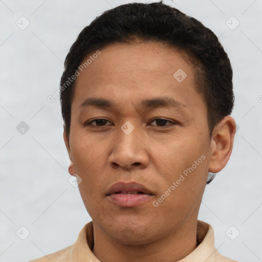 Neutral white adult male with short  black hair and brown eyes