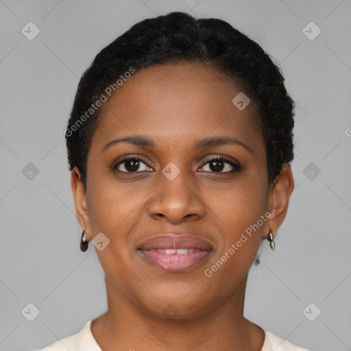 Joyful black young-adult female with short  brown hair and brown eyes