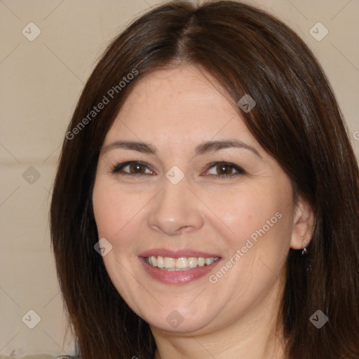 Joyful white adult female with medium  brown hair and brown eyes