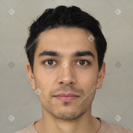 Neutral latino young-adult male with short  black hair and brown eyes