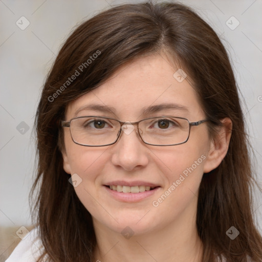 Joyful white adult female with long  brown hair and brown eyes