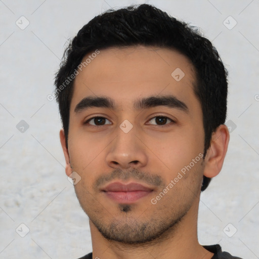 Neutral latino young-adult male with short  black hair and brown eyes