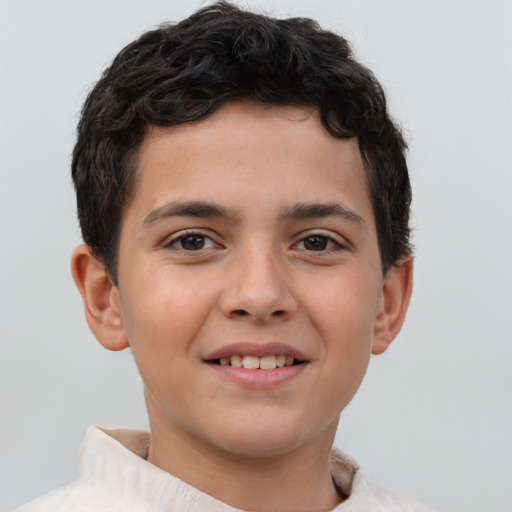 Joyful white child male with short  brown hair and brown eyes