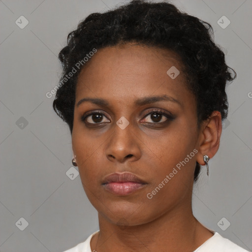 Neutral black young-adult female with short  black hair and brown eyes