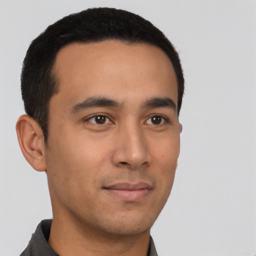 Neutral latino young-adult male with short  brown hair and brown eyes