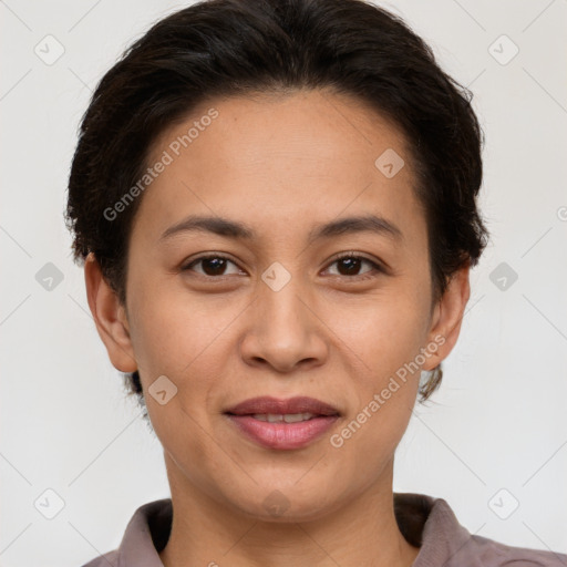 Joyful white adult female with short  brown hair and brown eyes