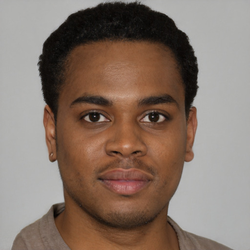 Neutral black young-adult male with short  brown hair and brown eyes