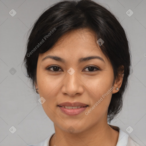 Joyful asian adult female with medium  brown hair and brown eyes