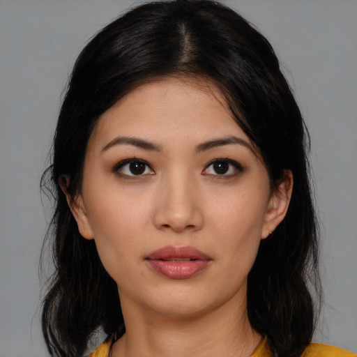 Neutral white young-adult female with medium  black hair and brown eyes