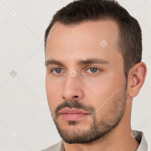 Neutral white young-adult male with short  brown hair and brown eyes