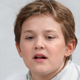 Joyful white child female with short  brown hair and grey eyes