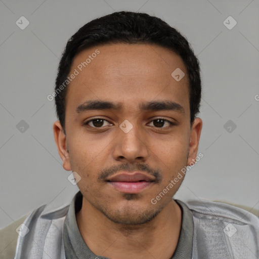 Neutral latino young-adult male with short  black hair and brown eyes