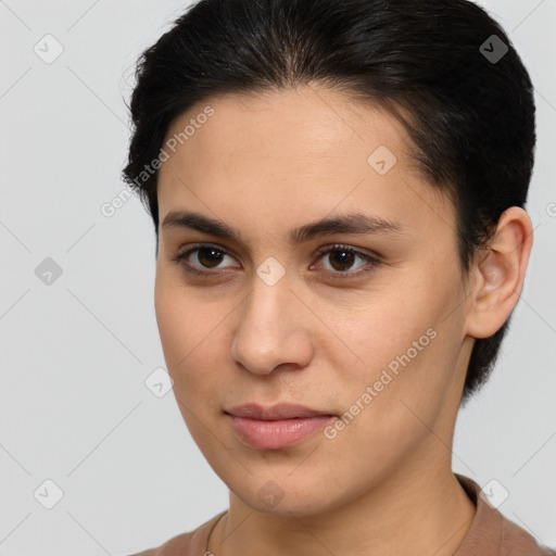 Joyful white young-adult female with short  brown hair and brown eyes