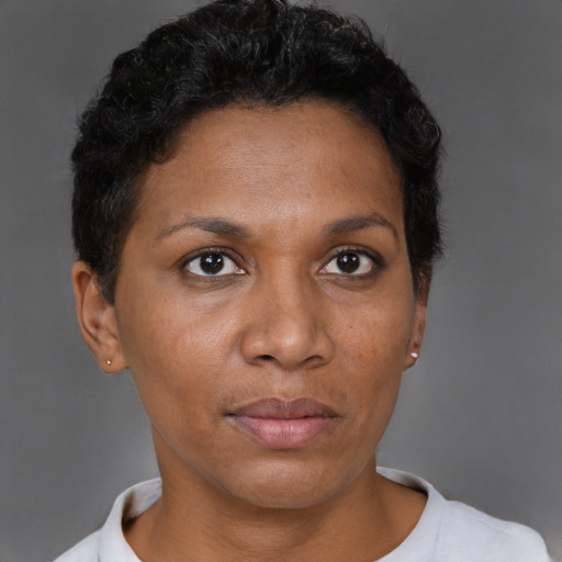 Neutral black adult female with short  brown hair and brown eyes