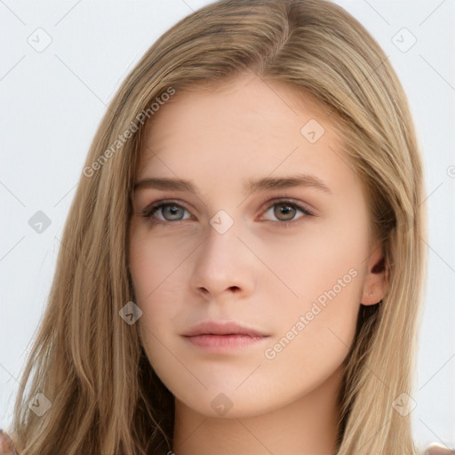 Neutral white young-adult female with long  brown hair and brown eyes