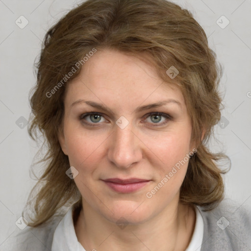 Joyful white young-adult female with medium  brown hair and blue eyes