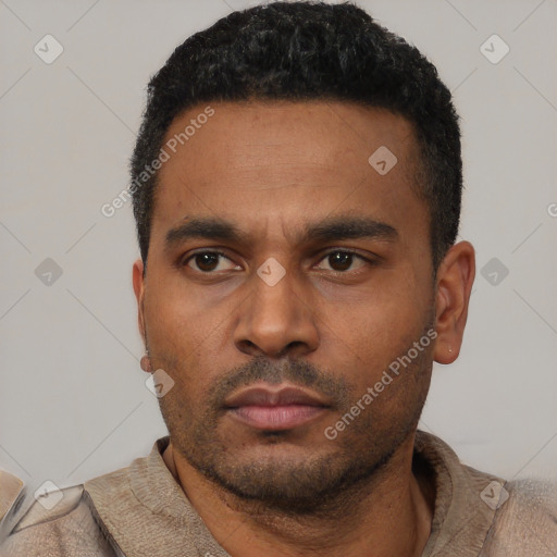 Neutral latino young-adult male with short  black hair and brown eyes