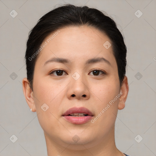 Joyful asian young-adult female with short  brown hair and brown eyes