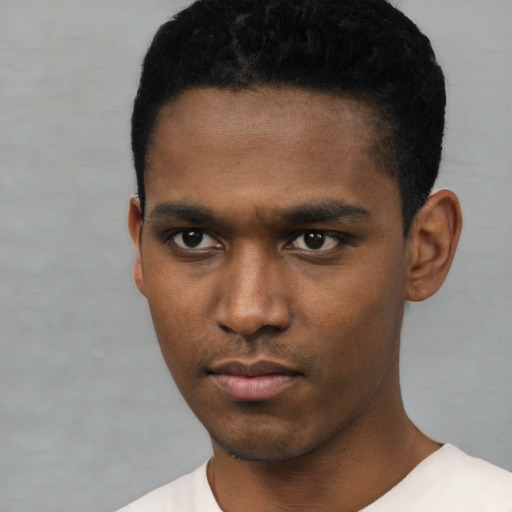 Neutral black young-adult male with short  black hair and brown eyes