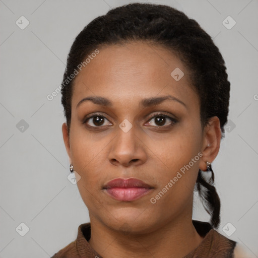 Neutral black young-adult female with short  brown hair and brown eyes