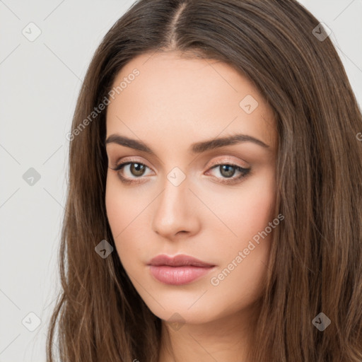 Neutral white young-adult female with long  brown hair and brown eyes