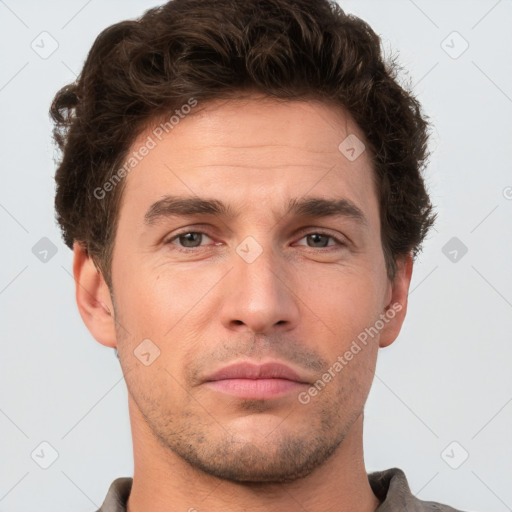 Neutral white adult male with short  brown hair and brown eyes