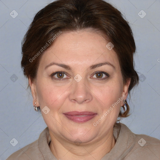 Joyful white adult female with medium  brown hair and brown eyes