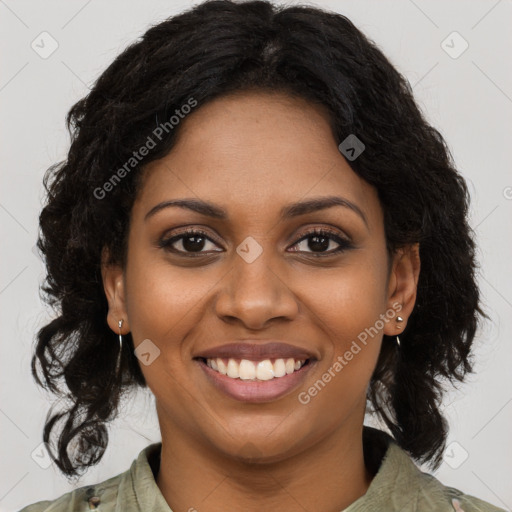 Joyful black young-adult female with medium  brown hair and brown eyes