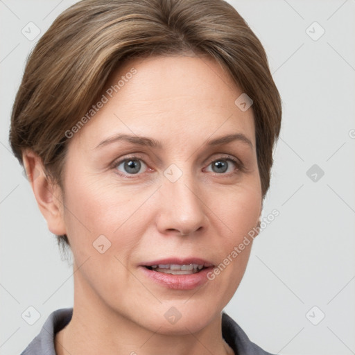 Joyful white adult female with short  brown hair and grey eyes