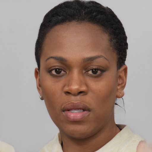 Neutral black young-adult female with short  black hair and brown eyes
